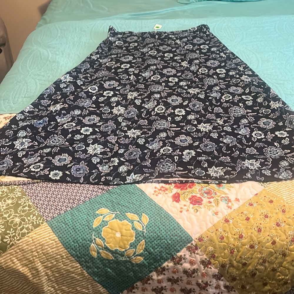 Long blue floral skirt size medium with light blue flowers.